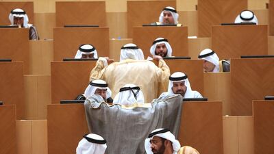 Companies are employing UAE nationals only to meet Emiratisation targets without requiring them to come to work, the FNC was told on Wednesday. Fatima Al Marzooqi / The National