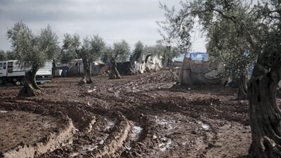 Location: Al-Karama camp in Atama. The aftermath of heavy rainfall on north Syria, residents lost their furniture, clothes and bedding as well as the tents waiting outside in open lands until the civil defense and NGs arrive to rescue them.