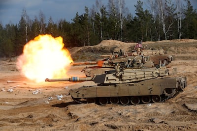 US Army M1A1 Abrams tank fires during Nato Enhanced Forward Presence battle group military exercise in 2021. Reuters