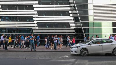 Morning commuters leave Noor Bank Metro station in Dubai. Demand is outpacing supply for jobs in the city, causing companies and recruiters to cut wages and benefts packages. Victor Besa / The National