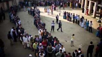 Long queues formed as local citizens began to vote at the country's 35,000 heavily guarded polling stations. Bangladesh went to the polls under tight security in the first elections since 2001.