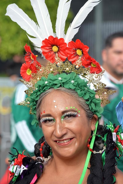 Many fans dressed in the Mexican flag colours of green, white and red. AFP