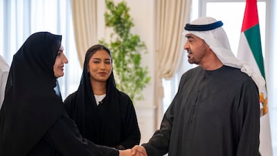 Sheikh Mohamed greets the mother of Rouda