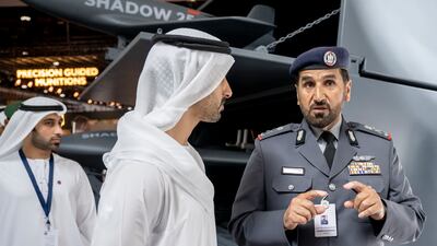 Sheikh Hamdan bin Mohamed, left, and Abu Dhabi Police chief Maj Gen Al Mazrouei visit Idex