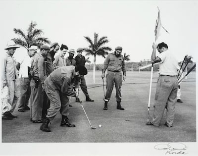 Ernesto 'Che' Guevara and Fidel Castro playing a mock round of golf in 1961