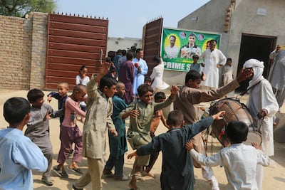Children celebrate in Nadeem's hometown of Mian Channu. AFP