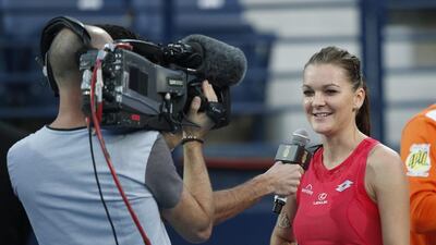 Agnieszka Radwanska of Micromax Indian Aces talks to media TV after winning against Mirjana Lucic-Baroni of Legendari Japan Warrios during the International Premier Tennis League (IPTL) at Dubai Duty Free Tennis Stadium in Dubai, United Arab Emirates, 14 December 2015. EPA/ALI HAIDER