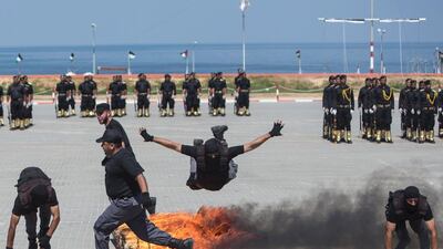 Members of the Palestinian Hamas security forces take part in a graduation ceremony in Gaza City. Mahmud Hams / AFP