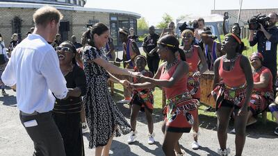 On the first day of their official tour 10-day tour of South Africa, the couple visited Cape Town's Nyanga township, and people from the Justice Desk initiative. Reuters