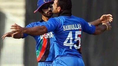Nawroz Mangal, left, the Afghanistan captain, will hope Samiullah Shenwari, right, can trouble Australia with his spin tomorrow. Satish Kumar / The National