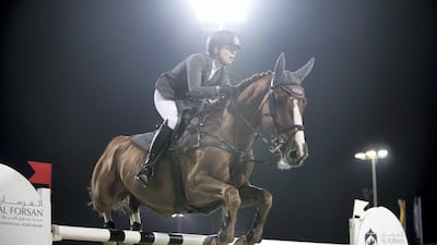 Miriam Schneider rides Benur Du Romet at Fatima bint Mubarak International Showjumping competition. Reem Mohammed / The National