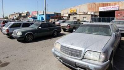 Abandoned cars in Musaffah line the streets. A reader advocates the elimination of old cars in order to reduce congestion and improve air quality.