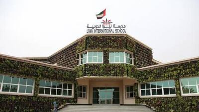 Liwa International School in Al Ain is a model of environmentally aware building, with a wall of plants helping cool the building, rooftop solar panels providing power, and two tanks filtering "grey" water for irrigation purposes. Above, the exterior of Liwa International School in Al Ain.