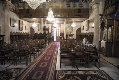 A member of Gaza's Greek Orthodox Christian community arrives early for Sunday mass at the Church of Saint Porphyrius in Gaza City on December 23, 2018. The church dates to the 12th Century. Photo by Heidi Levine for The National