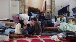 Displaced Syrians shelter in a mosque after clashes between the SDF and the army in the north-eastern city of Qamishli. Reuters
