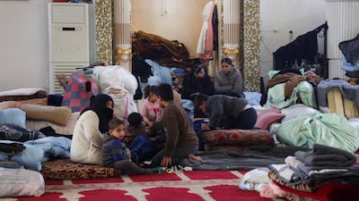 Displaced Syrians shelter in a mosque after clashes between the SDF and the army in the north-eastern city of Qamishli. Reuters