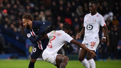 Neymar battles with Lille's Portuguese defender Tiago Djalo. AFP