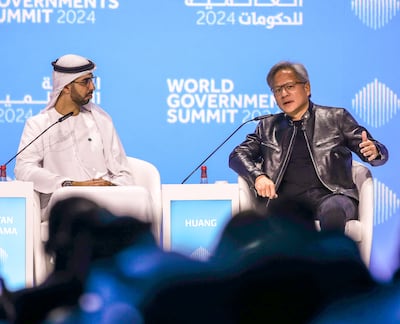 Nvidia chief executive Jensen Huang speaks with UAE Artificial Intelligence Minister Omar Al Olama during the World Government Summit in Dubai in February. Victoria Besa / The National