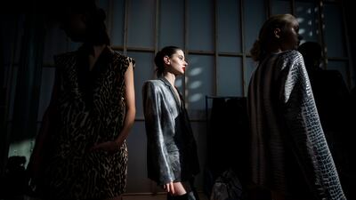 Models wait backstage at the 16th Budapest Central European Fashion Week, in Hungary. AP