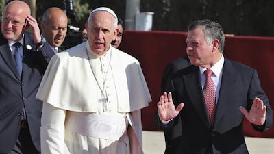 Jordan’s King Abdullah, right, walking and speaking to Pope Francis, who was leaving for the West Bank after his visit to Jordan. Muhammad Hamed/Reuters