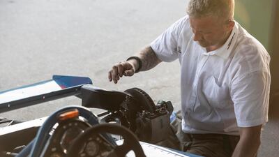 Working on the wheel hub and brake assembly of a Maki F101-C