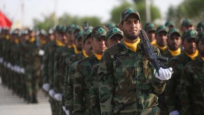 Members of the Liwa Al Tafuf 13th Brigade of Iraq's Hashed Al Shaabi paramilitary take part in a graduation ceremony in Karbala on August 30, 2019. AFP