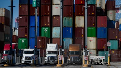 Containers are stacked at the Port of Long Beach in California. Global executives' sentiment is ending the year on a generally positive note, with most McKinsey survey respondents expecting 2022 to bring better economic conditions despite heightened risks from the pandemic and inflation. AP