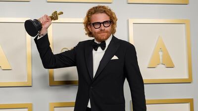 Best Cinematography: Erik Messerschmidt, for 'Mank', poses in the press room at the Oscars on Sunday, April 25, 2021, at Union Station in Los Angeles. AP Photo