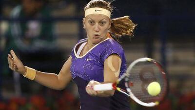 Petra Kvitova of the Czech Republic hits a return to Caroline Wozniacki of Denmark during their women's singles semi-final match at the Dubai Duty Free Tennis Championships on Friday. Ahmed Jadallah / Reuters
