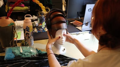 Technicians create the character's insect headpieces