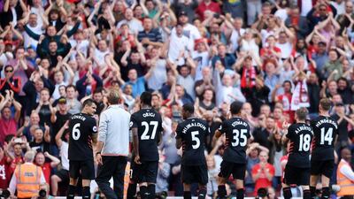 Liverpool manager Jurgen Klopp celebrates with their players and fans after the match against Arsenal at the Emirates Stadium in London, Britain, 14 August 2016. Tony O’Brien / Action Images / Reuters