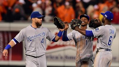 From left, Alex Gordon, Jarrod Dyson and Lorenzo Cain of the Kansas City Royals celebrate defeating the Baltimore Orioles in Game 2 of the American League Championship Series at Camden Yards on October 11, 2014, in Baltimore, Maryland. Patrick Smith / Getty Images