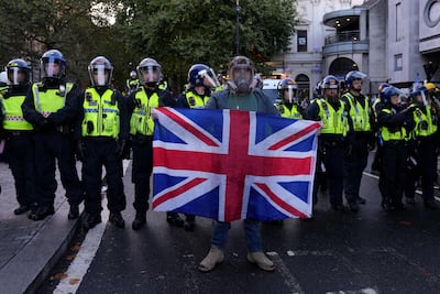 Supporters of British far-right activist Tommy Robinson gather for a march in central London, overseen by a large police presence. AFP