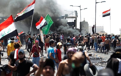 Iraqi demonstrators take part in anti-government protests in Baghdad last month. Reuters