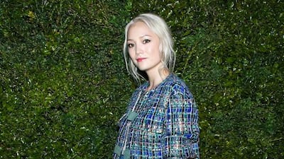 Canadian-born French actress Pom Klementieff, who will be seen in Guardians of the Galaxy 2, carried a Chanel bag and wore Chanel shoes along with an iridescent blue, green, black and pink jacket and skirt, and a light pink georgette crepe dress from Chanel’s spring/summer 2017 ready-to-wear collection. Courtesy Chanel