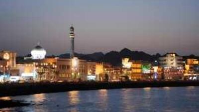 Muscat by night. Oman is expanding airports and building new ones to facilitate its tourism industry.
