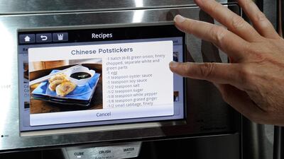 Companies like Samsung and LG have already launched smart fridges, washing machines and vacuum cleaners that relay information back to the user’s mobile phone. Ethan Miller / Getty Images