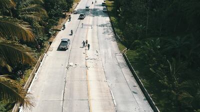 epa07961840 An aerial shot taken with a drone shows a damaged road in the aftermath of a 6.5 magnitude earthquake, in Kidapawan city, Cotabato province, Philippines, 31 October 2019. According to the United States Geological Survey (USGS), a 6.5 magnitude earthquake occurred at a depth of 10km near Bulatukan, Cotabato province, on 31 October. It is the third strong earthquake the area has experienced this month. EPA/CERILO EBRANO