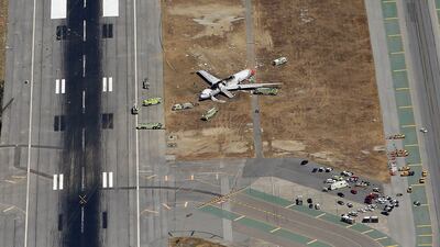 The Boeing 777 airplane lies burned on the runway after it crash landed at San Francisco International Airport. Ezra Shaw/Getty Images/AFP