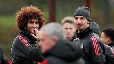 Marouane Fellaini, left, is understood to want a longer-term contract than the one being offered by the United board. Jason Cairnduff