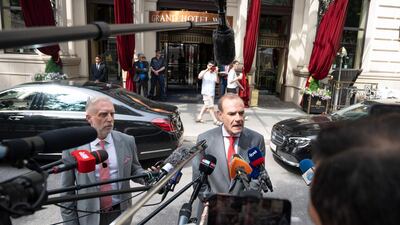 Enrique Mora speaks to the press outside the Grand Hotel Wien where talks were held. AFP