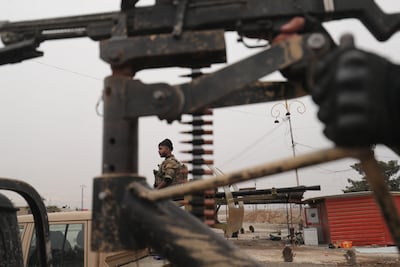Syrian Democratic Forces fighters take position in Hasakeh, north-east Syria. AFP