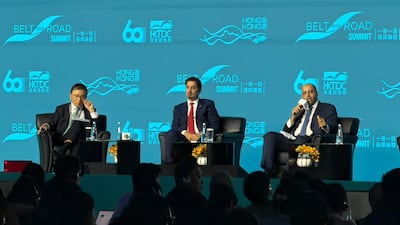 From left, WeLab Bank chairman KC Chan, Mansoor Al Khater, chief executive of the Qatar Financial Centre, and Muneer Al Muneeri, deputy president for operations at the Oman Investment Authority at the Belt and Road Summit in Hong Kong. Alvin R Cabral / The National