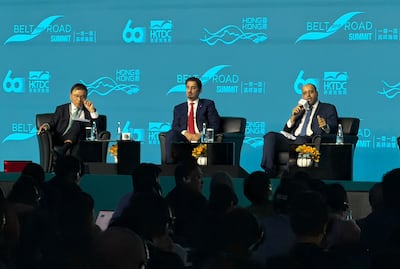 From left, WeLab Bank chairman KC Chan, Mansoor Al Khater, chief executive of the Qatar Financial Centre, and Muneer Al Muneeri, deputy president for operations at the Oman Investment Authority at the Belt and Road Summit in Hong Kong. Alvin R Cabral / The National