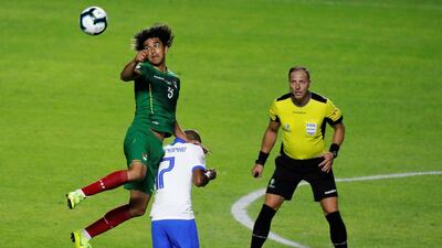 David Neres, centre, of Brazil vies for the ball with Marcelo Martinsof Bolivia. EPA