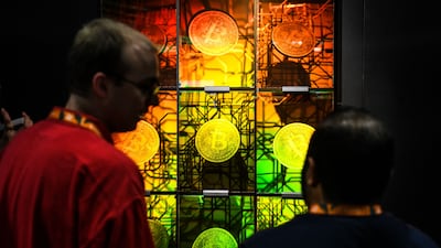 Bitcoin-themed art in Miami last month. The cryptocurrency fell below $30,000 last week. AFP