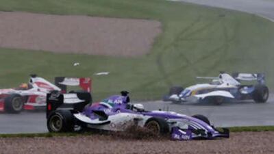 The Al Ain car, driven by Andreas Züber, slides into the gravel at Donington Park after hitting the Porto car during the second race of the inaugural meeting of the Superleague Formula series.