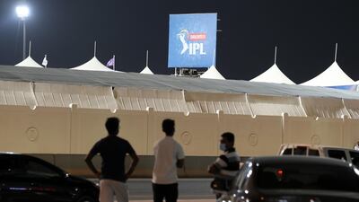 Cricket fans wait in anticipation a ball will head their way from Sharjah Cricket Stadium.