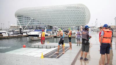 Triathletes get ready to begin the ITU World Triathlon Abu Dhabi. Reem Mohammed / The National