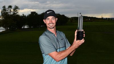 Paul Peterson poses with the trophy following his victory at the Czech Masters. Richard Martin-Roberts / Getty Images